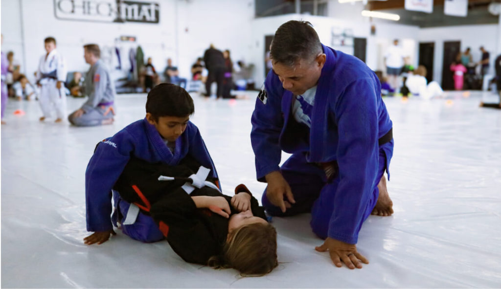 Eli giving instructions in kids' class.