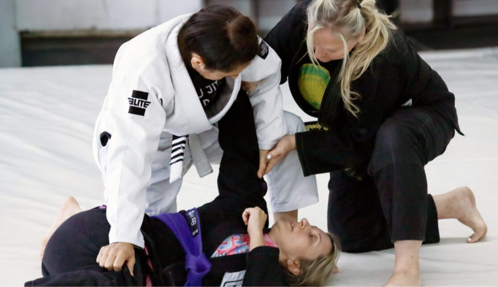 Brandy instructing Women's BJJ class